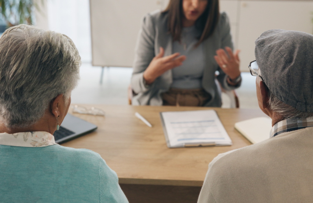 Estate planning attorney discussing family decisions with clients